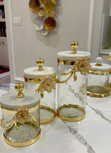 Load image into Gallery viewer, Hammered Glass Canister With White Enamel and Gold Leaf Flower:
