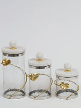 Load image into Gallery viewer, Gold and Glass Canister with Floral Lotus Art
