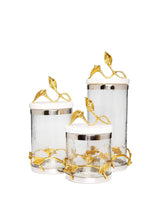 Load image into Gallery viewer, Gold and Glass Canister With Leaf Design And Marble Lid
